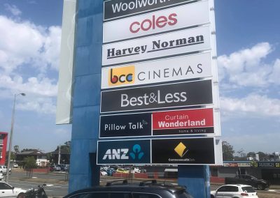 store signages lifted by walkabout cranes